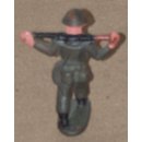 Soldier, marching with LMG across Shoulders