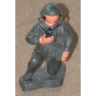 Radio Operator, kneeling with Headphones