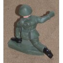 Soldier, kneeling, giving marching sign