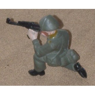 Soldier, kneeling, firing AK from Shoulder