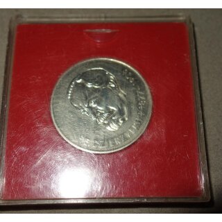 Coin in Plastic case, red filler